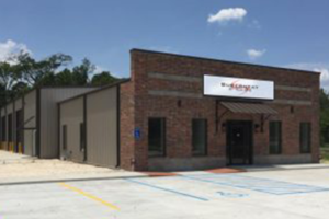 Façade of a Superheat Baton Rouge building front with the old logo