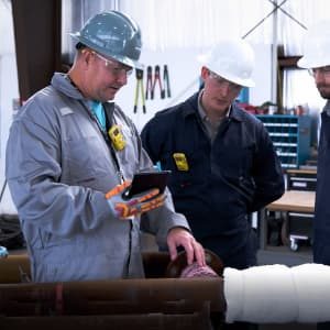 Superheat SmartWrap post weld heat treatment services being explained by a heat treatment technician.