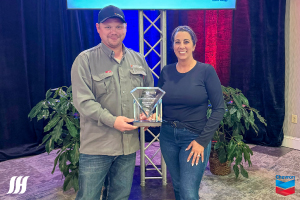 Allen Waits and Angelle Jeansonne accepting the 2024 Exceptional Performance Award from Chevron.